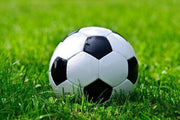 Soccer ball on green grass Wall Mural-Sports-Eazywallz